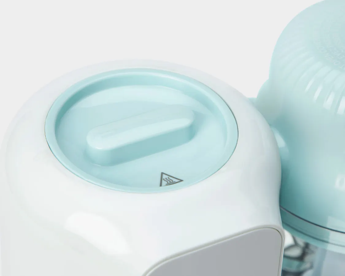 Close up of the water lid of the baby steam and blend on a white background